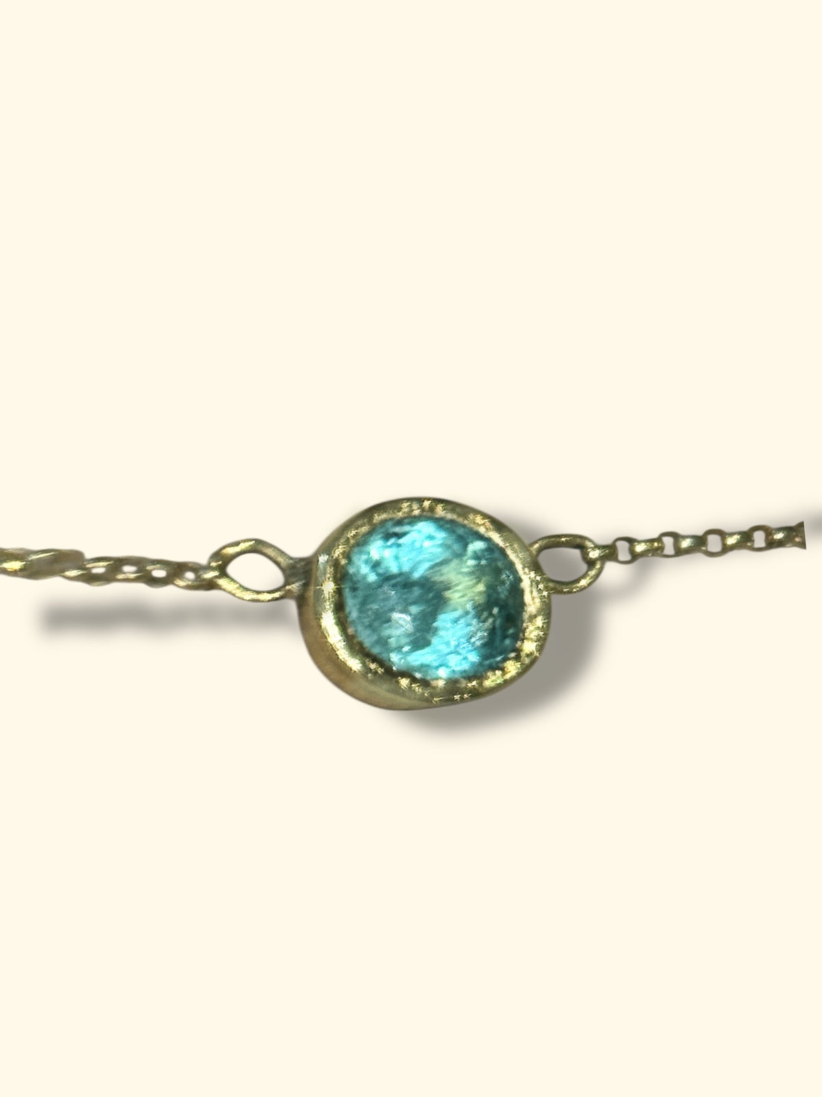 (Available at Tomfoolery) One Of A Kind Beautiful Glowy Blue Oval Paraiba Tourmaline Bezel Set Necklace 18 Ct Gold
