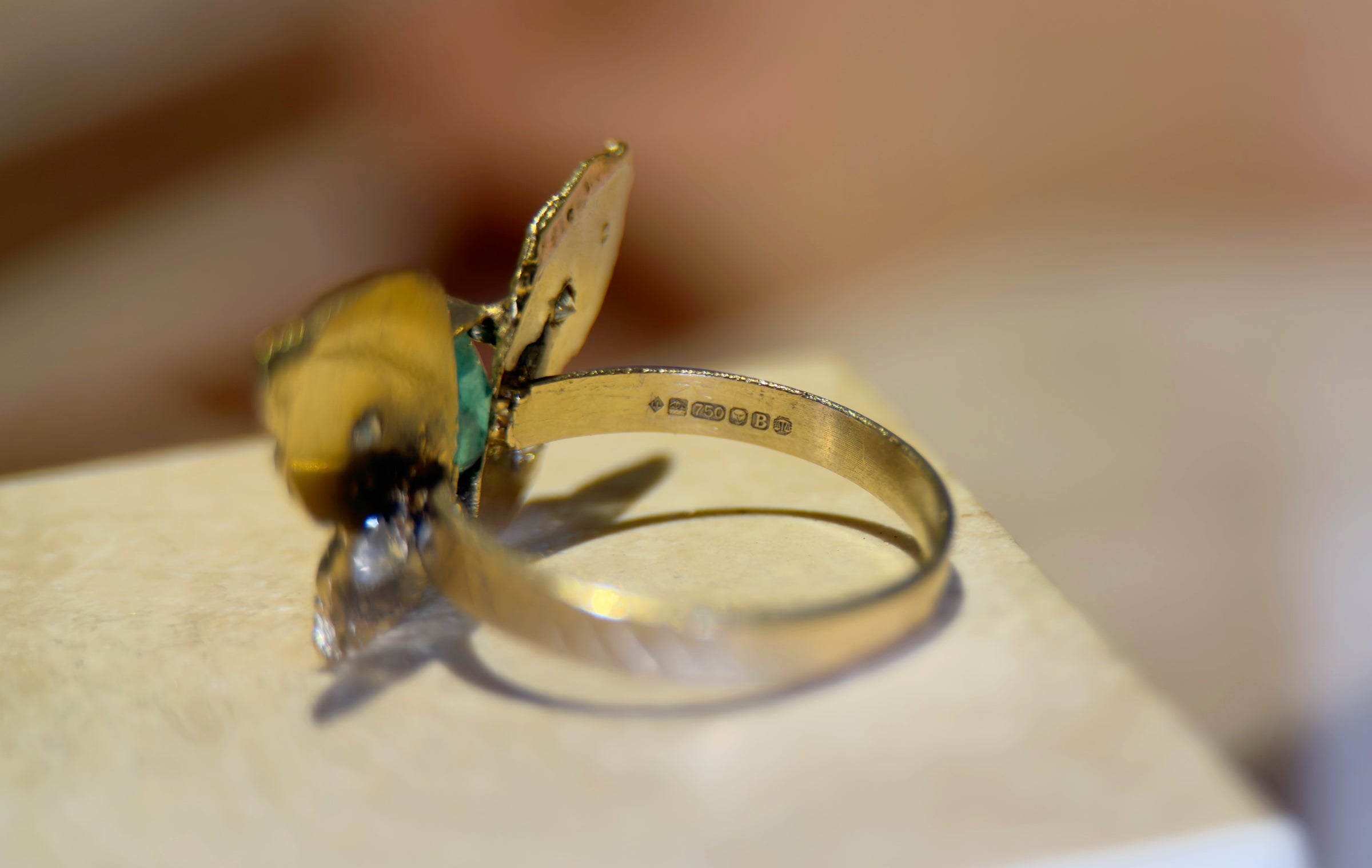 IGI Certified 1.3 Ct Emerald Queen Butterfly Ring with Diamonds in 18 Ct Gold Half Bezel (Available online and also to View in Person at Stardust, London 101 Walton Street)