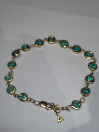 Emerald Bezel Pebbles Tennis Bracelet 18 Ct Gold