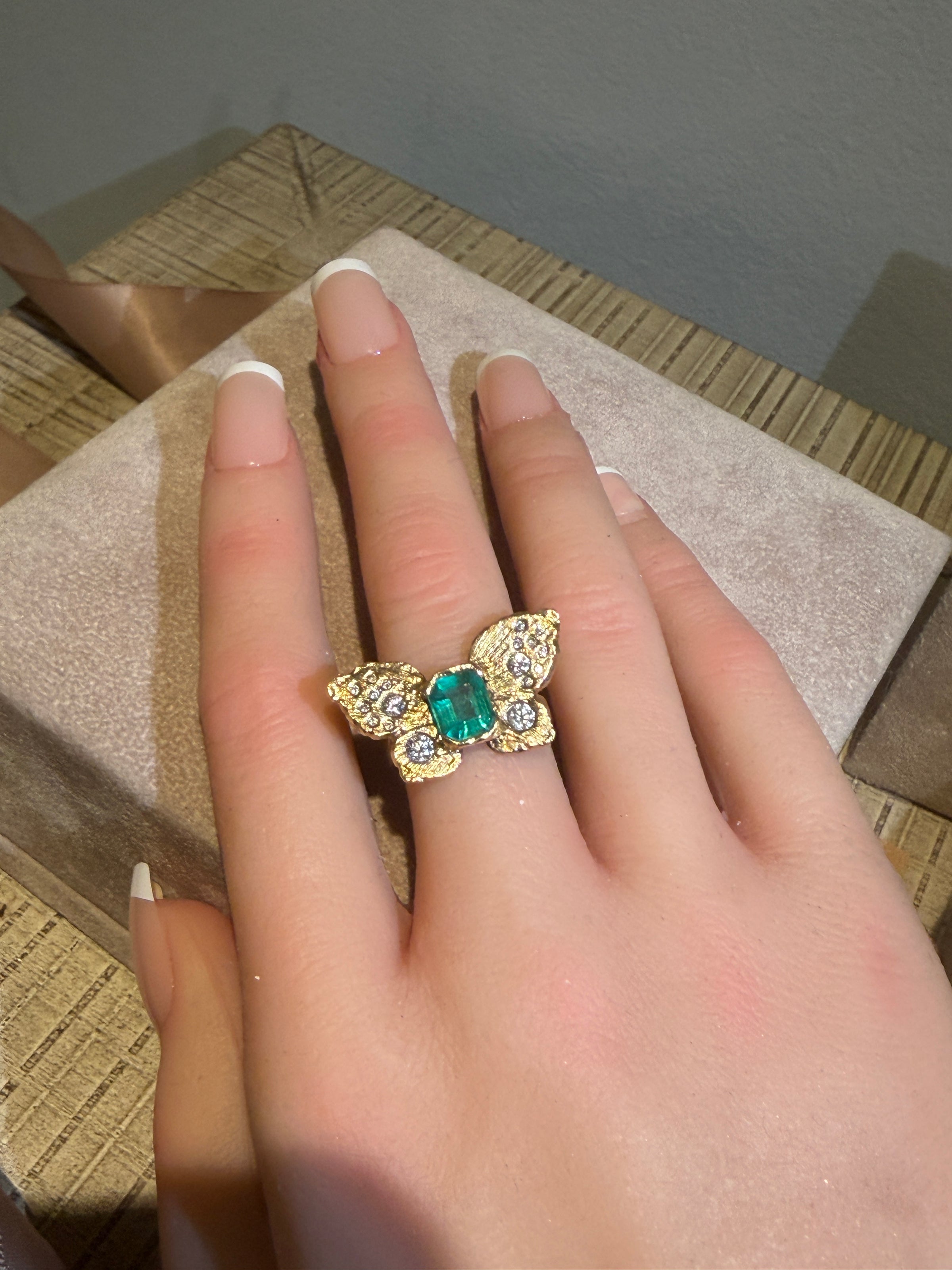 IGI Certified 1.3 Ct Emerald Queen Butterfly Ring with Diamonds in 18 Ct Gold Half Bezel (Available online and also to View in Person at Stardust, London 101 Walton Street)