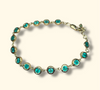 Emerald Bezel Pebbles Tennis Bracelet 18 Ct Gold