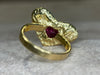 “Love you to Pieces” Ruby Heart, rubies baguettes, rounds and Diamonds 18 Ct Gold Ring