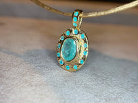 “Azul” Neon Blue Brazilian Paraiba Tourmalines and Mozambique Paraiba Oval Bezel Set Necklace