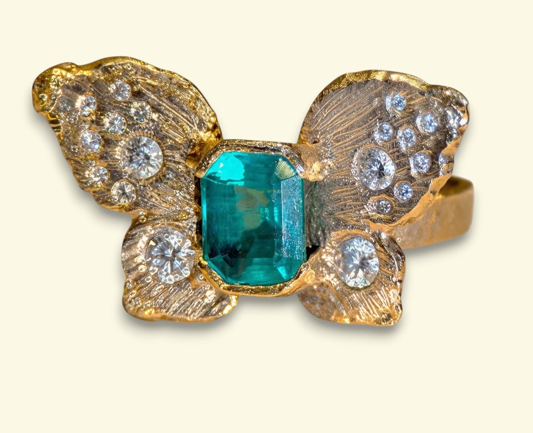 IGI Certified 1.3 Ct Emerald Queen Butterfly Ring with Diamonds in 18 Ct Gold Half Bezel (Available online and also to View in Person at Stardust, London 101 Walton Street)