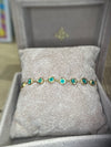 Emerald Bezel Pebbles Tennis Bracelet 18 Ct Gold