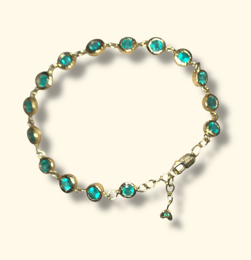 Emerald Bezel Pebbles Tennis Bracelet 18 Ct Gold