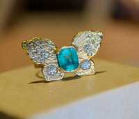 IGI Certified 1.3 Ct Emerald Queen Butterfly Ring with Diamonds in 18 Ct Gold Half Bezel (Available online and also to View in Person at Stardust, London 101 Walton Street)