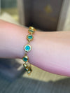 Emerald Bezel Pebbles Tennis Bracelet 18 Ct Gold