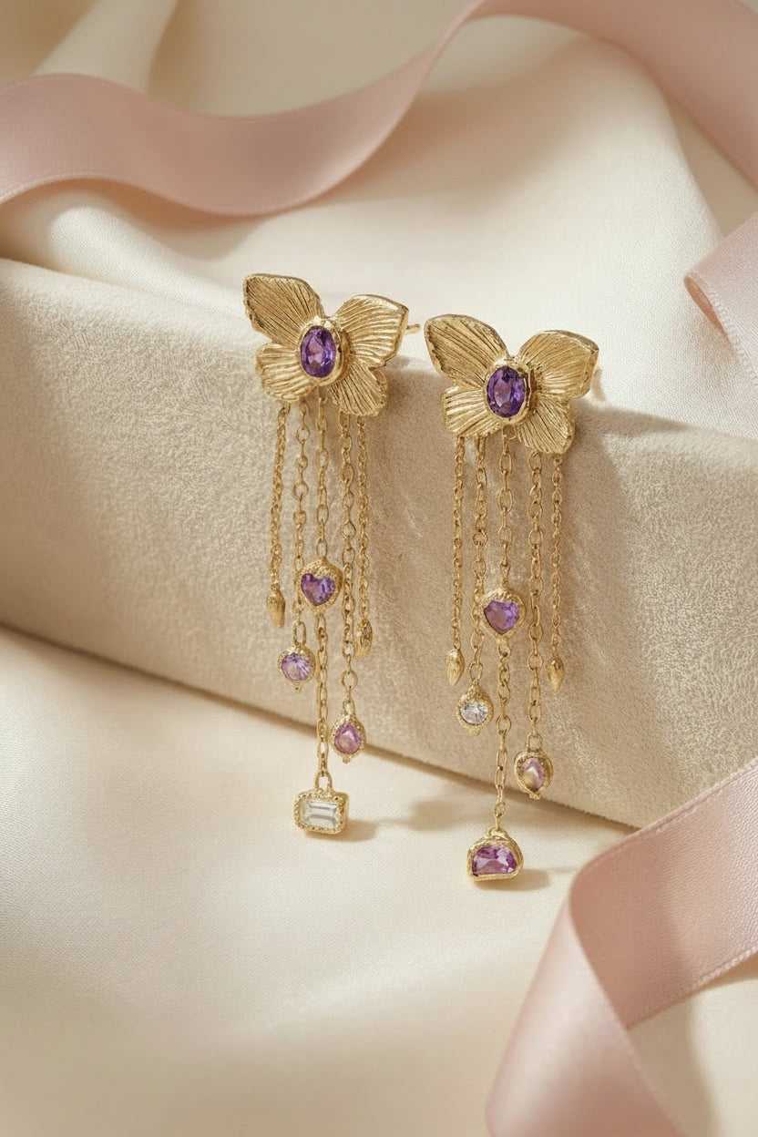 Butterfly Cuckoo Charm Earrings in 18 Ct Gold, Purple Oval Sapphires (Available at Tomfoolery London)