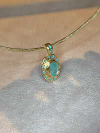 “Azul” Neon Blue Brazilian Paraiba Tourmalines and Mozambique Paraiba Oval Bezel Set Necklace