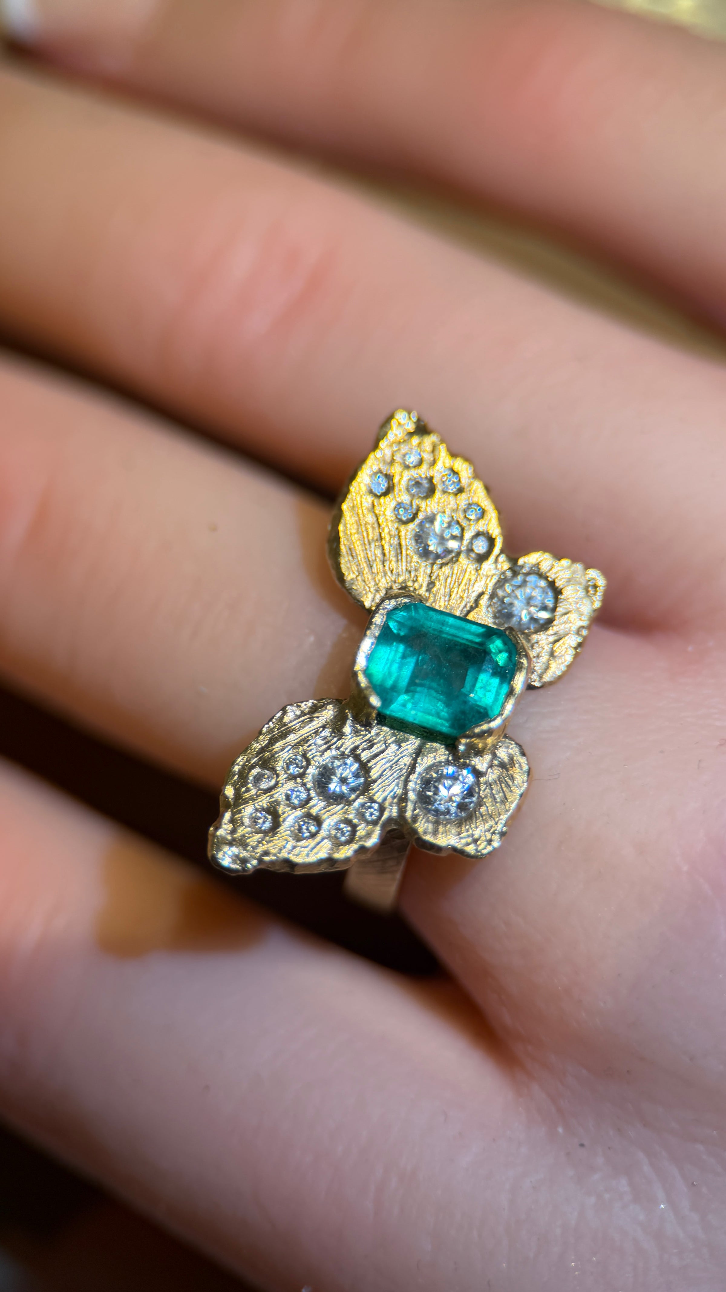 IGI Certified 1.3 Ct Emerald Queen Butterfly Ring with Diamonds in 18 Ct Gold Half Bezel (Available online and also to View in Person at Stardust, London 101 Walton Street)