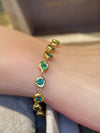 Emerald Bezel Pebbles Tennis Bracelet 18 Ct Gold