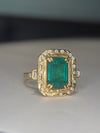 4.26 Cts Emerald Cut Art Deco 18 Ct Gold Ring with diamonds