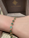 Emerald Bezel Pebbles Tennis Bracelet 18 Ct Gold