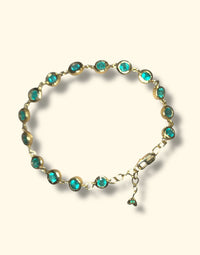 Emerald Bezel Pebbles Tennis Bracelet 18 Ct Gold