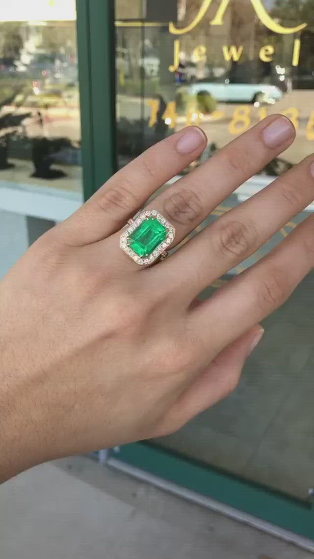 18K Emerald Ring with Diamond Halo Bespoke