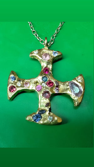 A One-of-a-Kind 18K Yellow Gold Cross Adorned with Sapphires