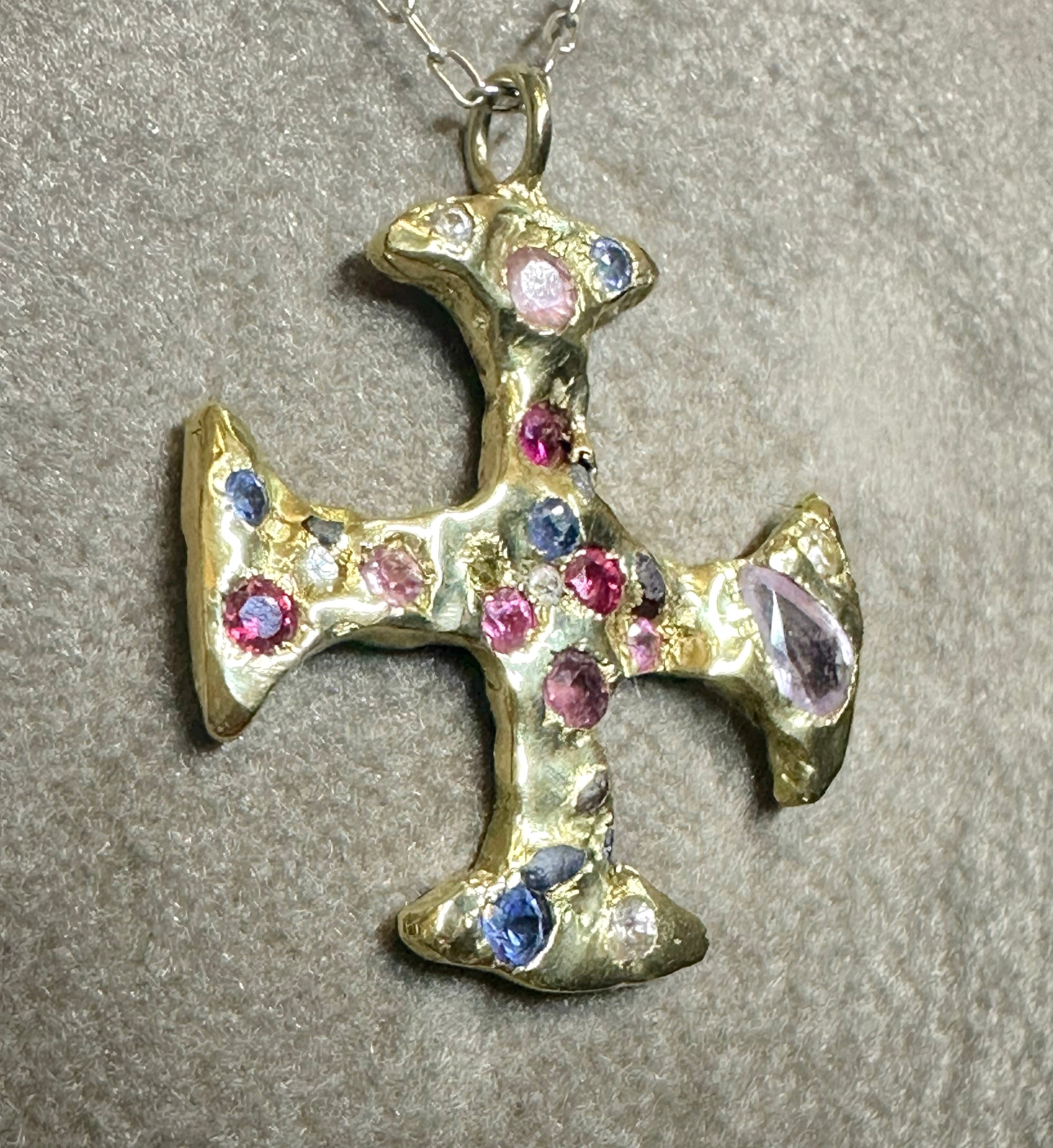 A One-of-a-Kind 18K Yellow Gold Cross Adorned with Sapphires