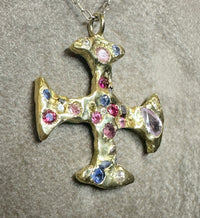 A One-of-a-Kind 18Ct Yellow Gold Cross Adorned with Sapphires